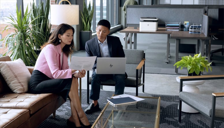 image of business man and woman in an office